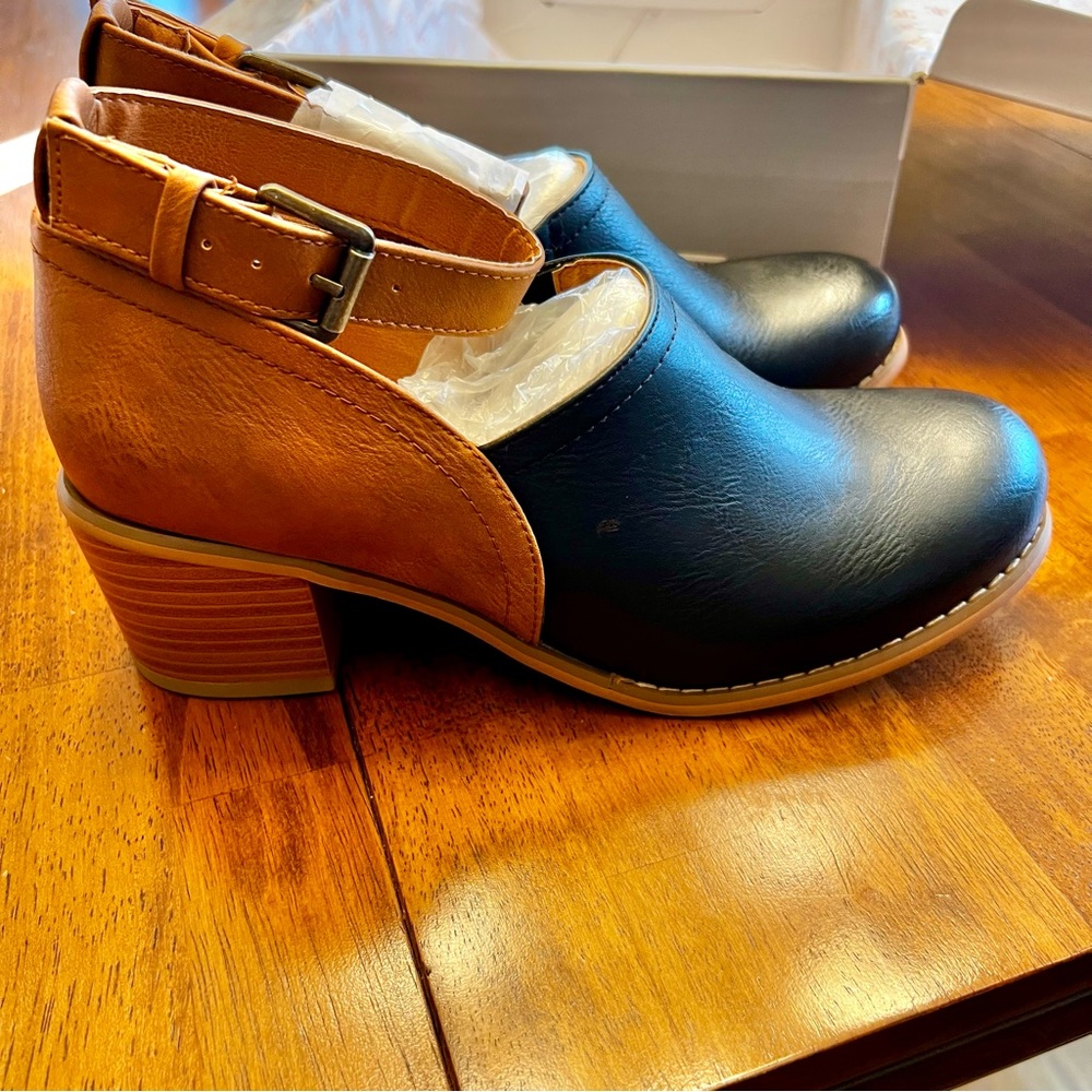 Chic Black and Tan Leather Mules